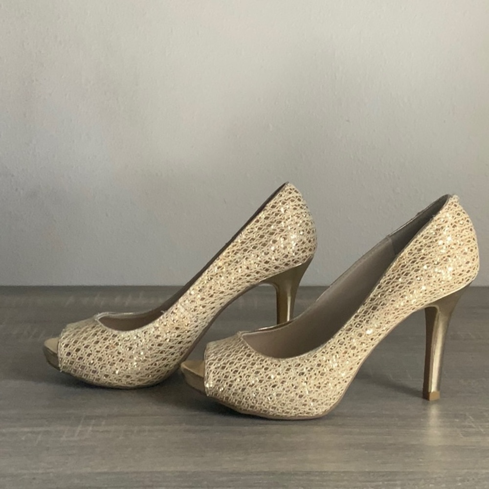 Gold open toe heel, never been worn in public, tag still attached no box.